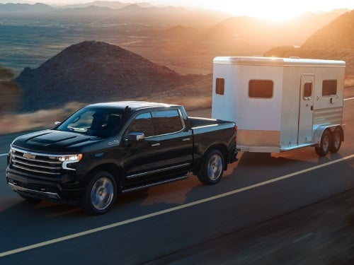 2024 Chevrolet Silverado 1500 towing an enclosed trailer