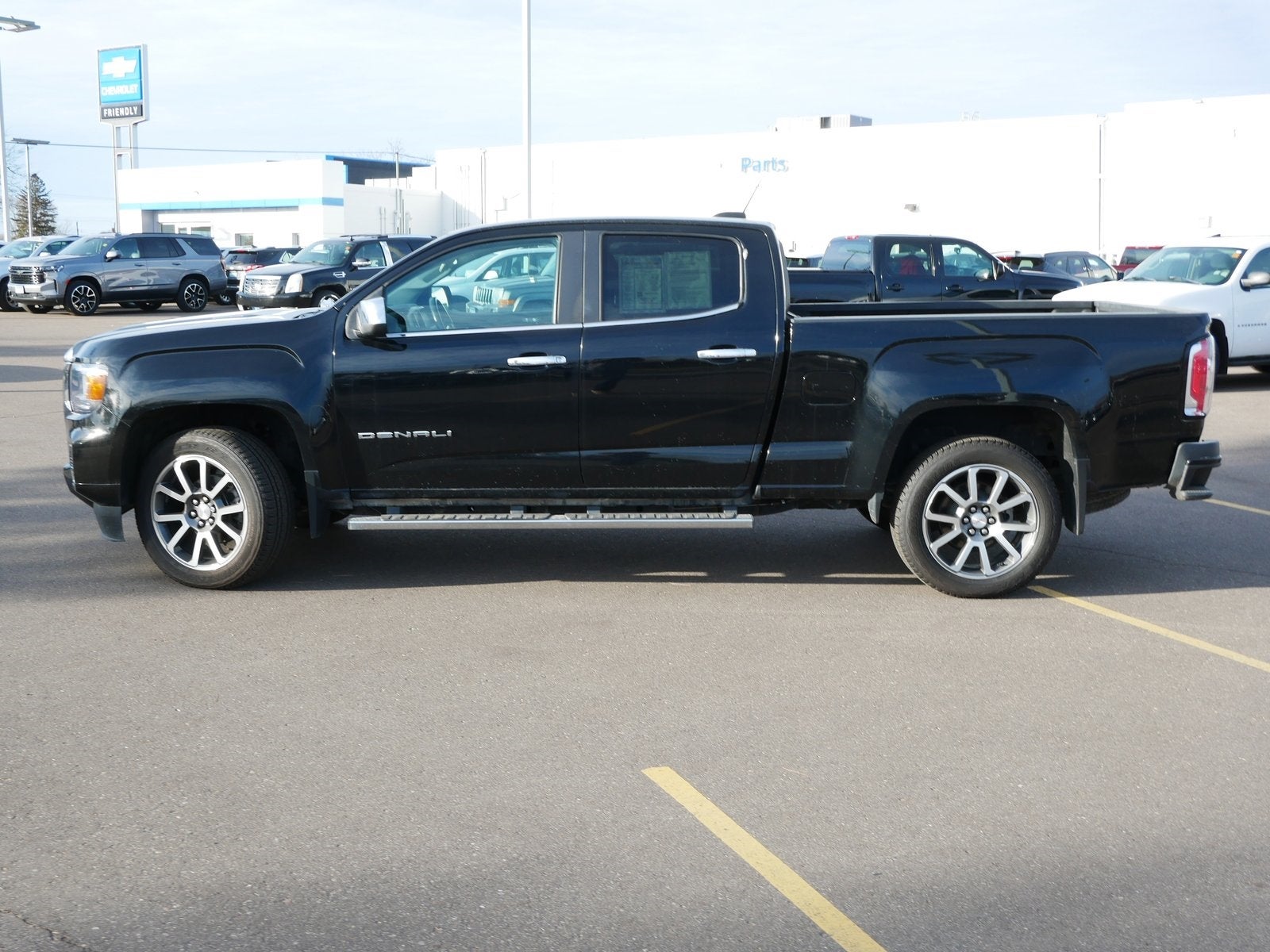 Used 2021 GMC Canyon Denali with VIN 1GTP6EE14M1121545 for sale in Fridley, Minnesota