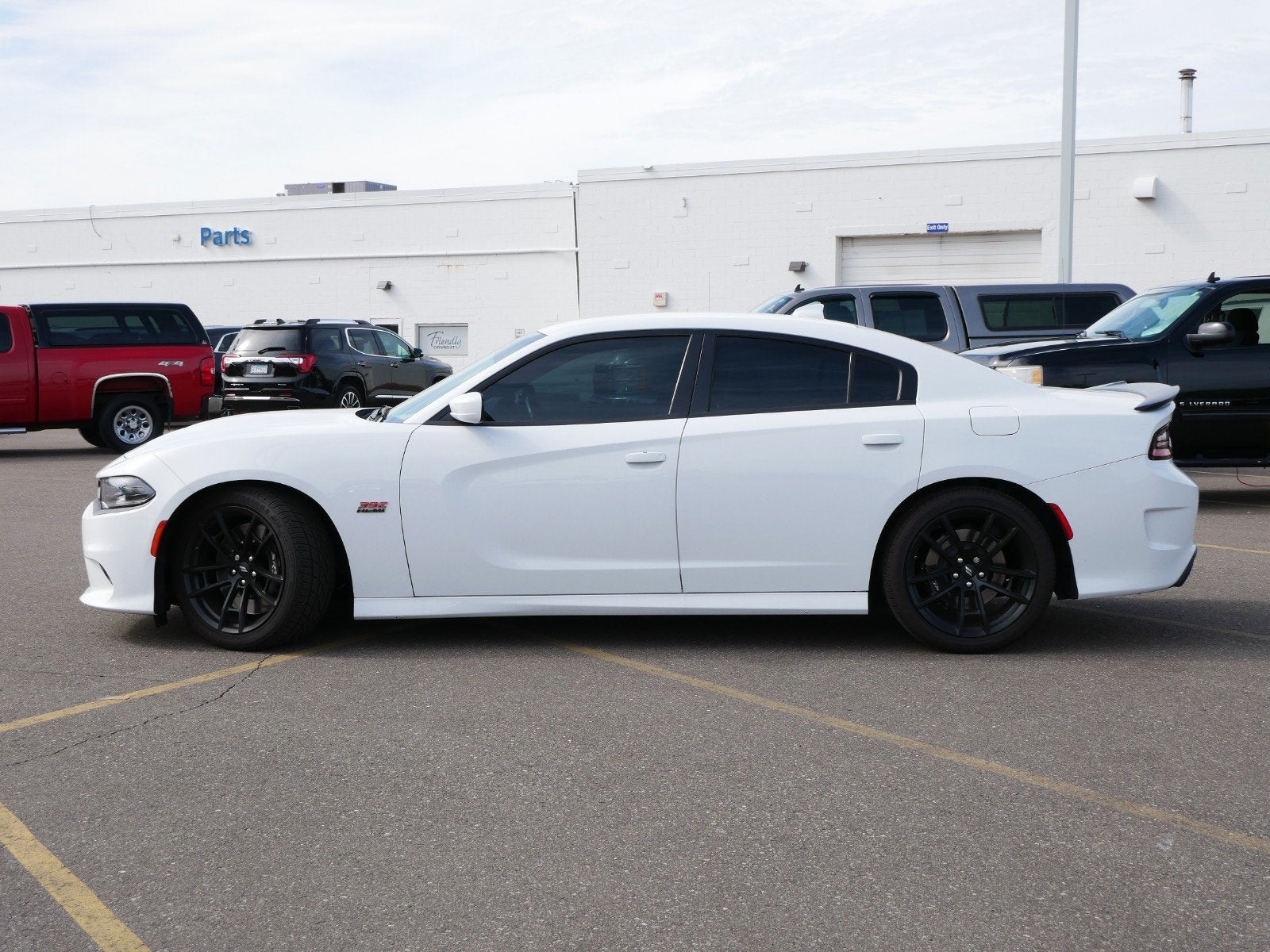 Used 2021 Dodge Charger Scat Pack with VIN 2C3CDXGJ8MH557673 for sale in Fridley, Minnesota