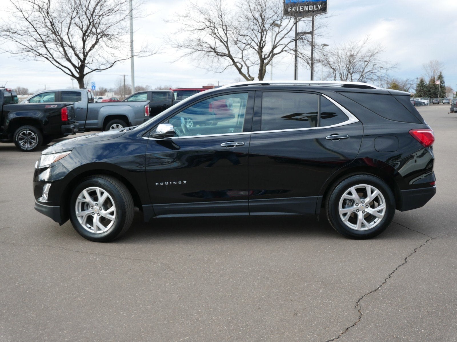 Used 2021 Chevrolet Equinox Premier with VIN 2GNAXNEVXM6151837 for sale in Fridley, Minnesota