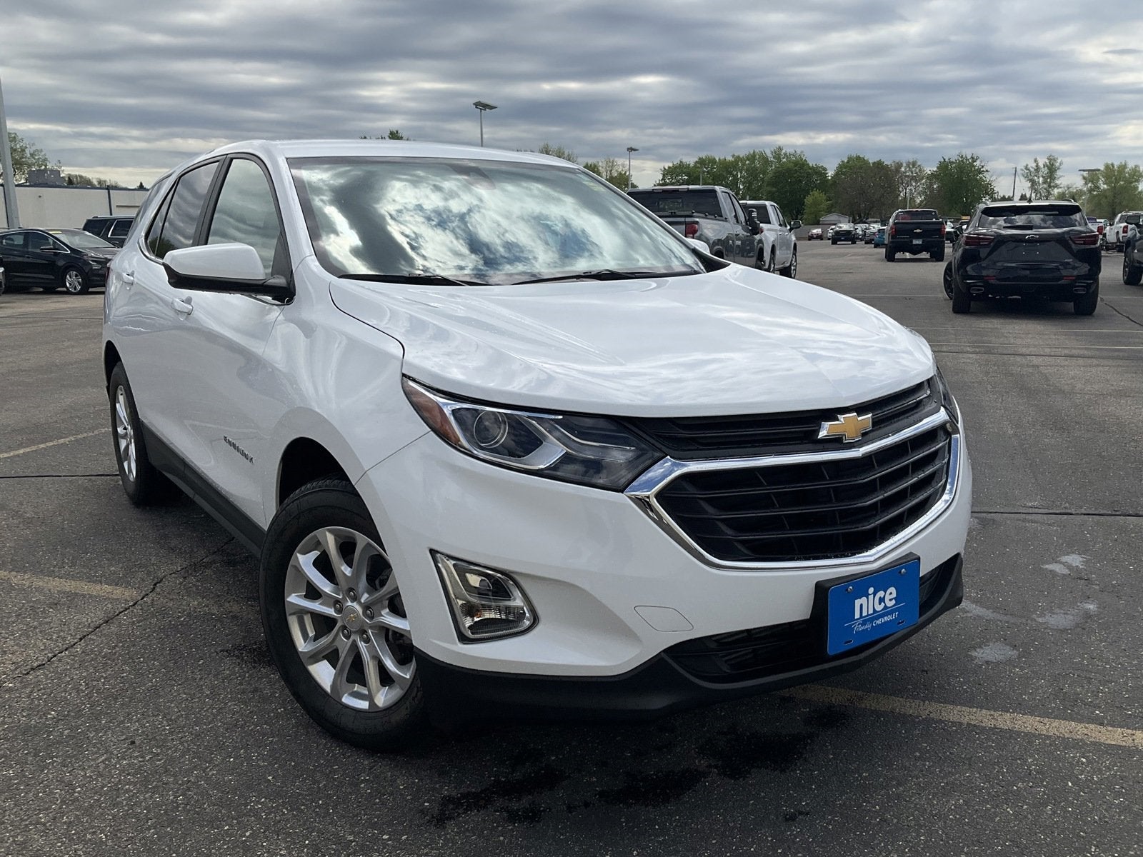 Used 2021 Chevrolet Equinox LT with VIN 2GNAXTEV7M6161567 for sale in Fridley, Minnesota
