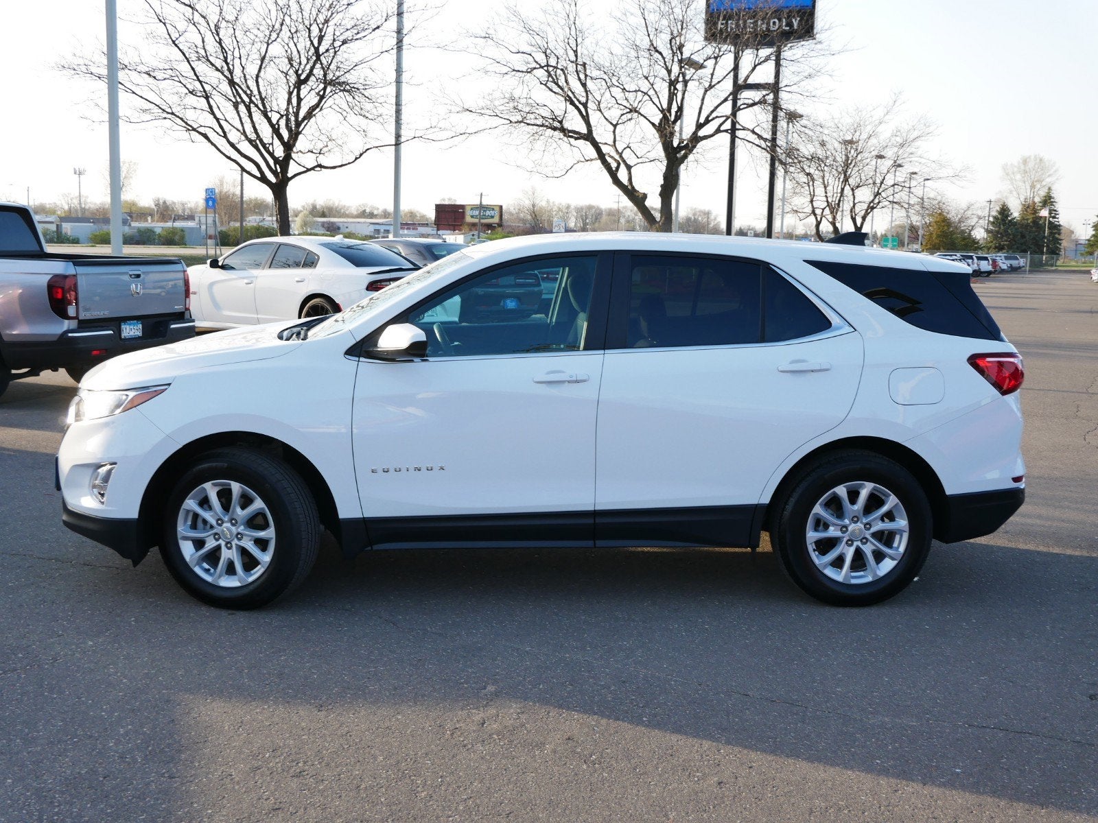 Used 2021 Chevrolet Equinox LT with VIN 3GNAXKEV3MS118940 for sale in Fridley, Minnesota
