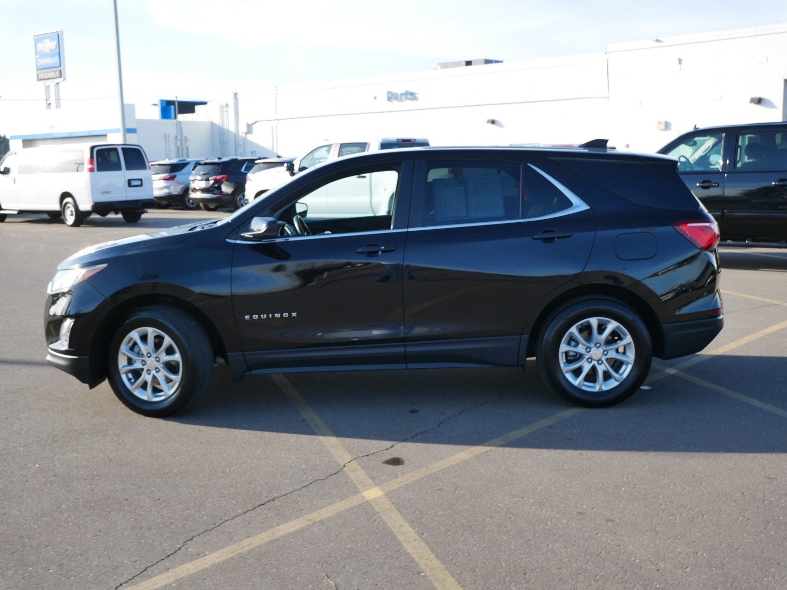Used 2021 Chevrolet Equinox LT with VIN 3GNAXUEV0ML393283 for sale in Fridley, Minnesota