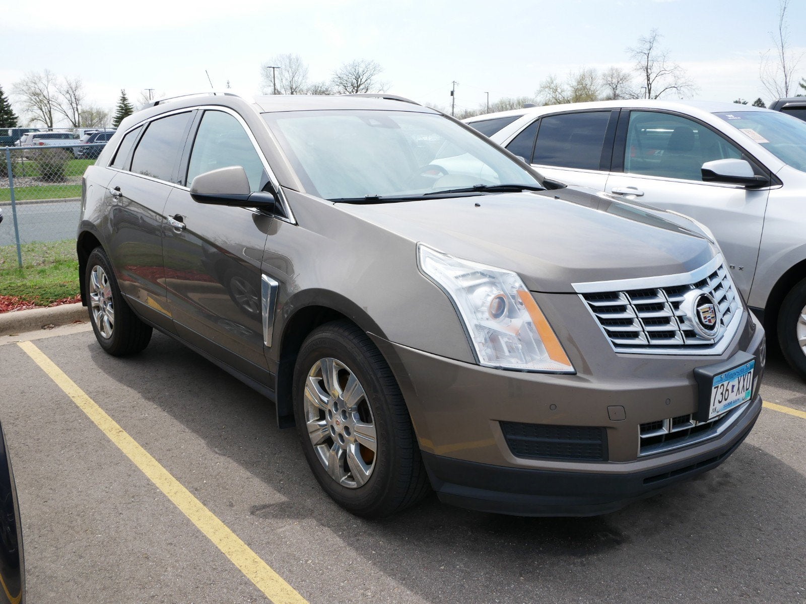 Used 2014 Cadillac SRX Luxury Collection with VIN 3GYFNEE39ES641069 for sale in Fridley, Minnesota