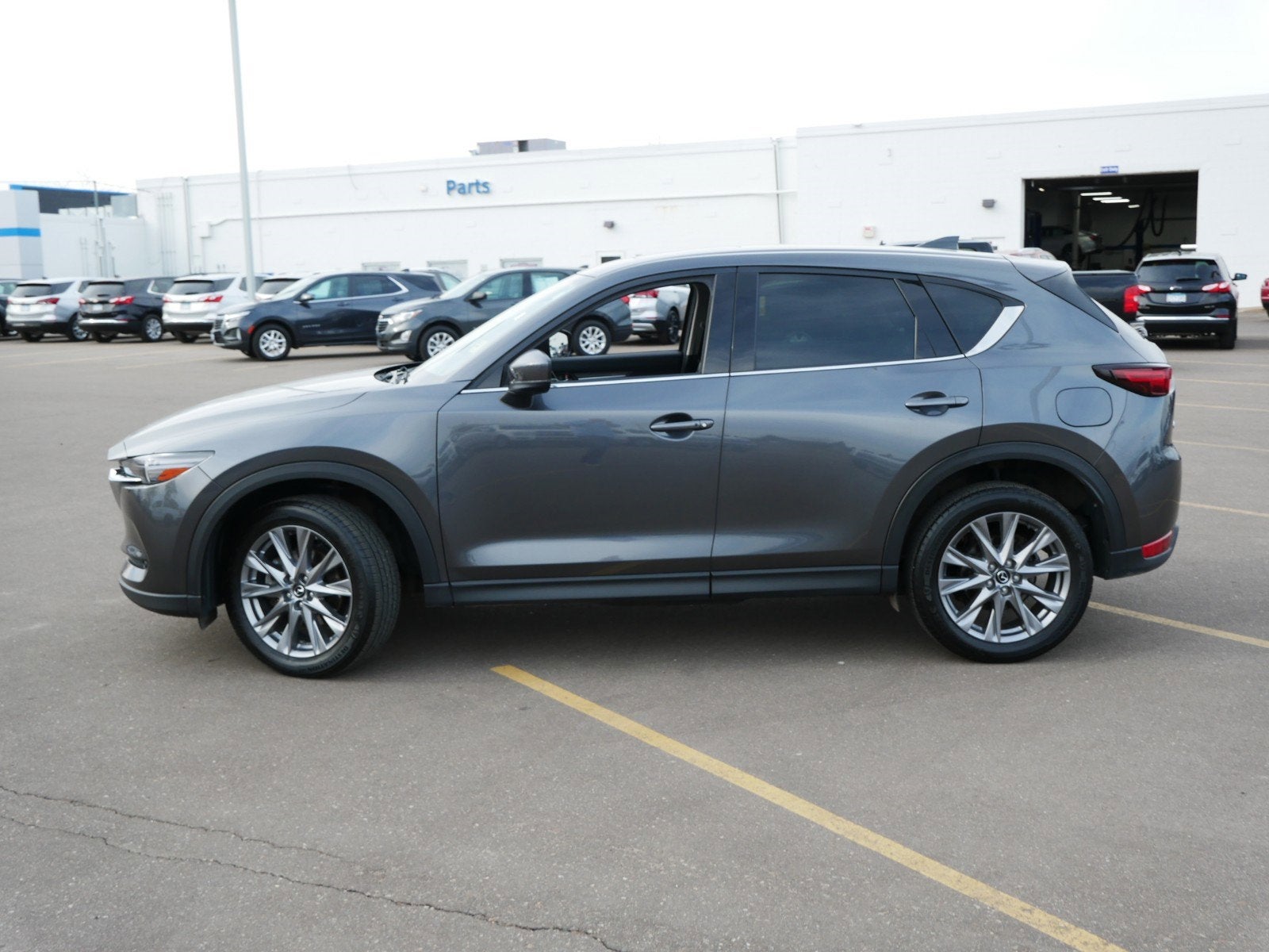 Used 2021 Mazda CX-5 Grand Touring Reserve with VIN JM3KFBAY9M0315089 for sale in Fridley, Minnesota