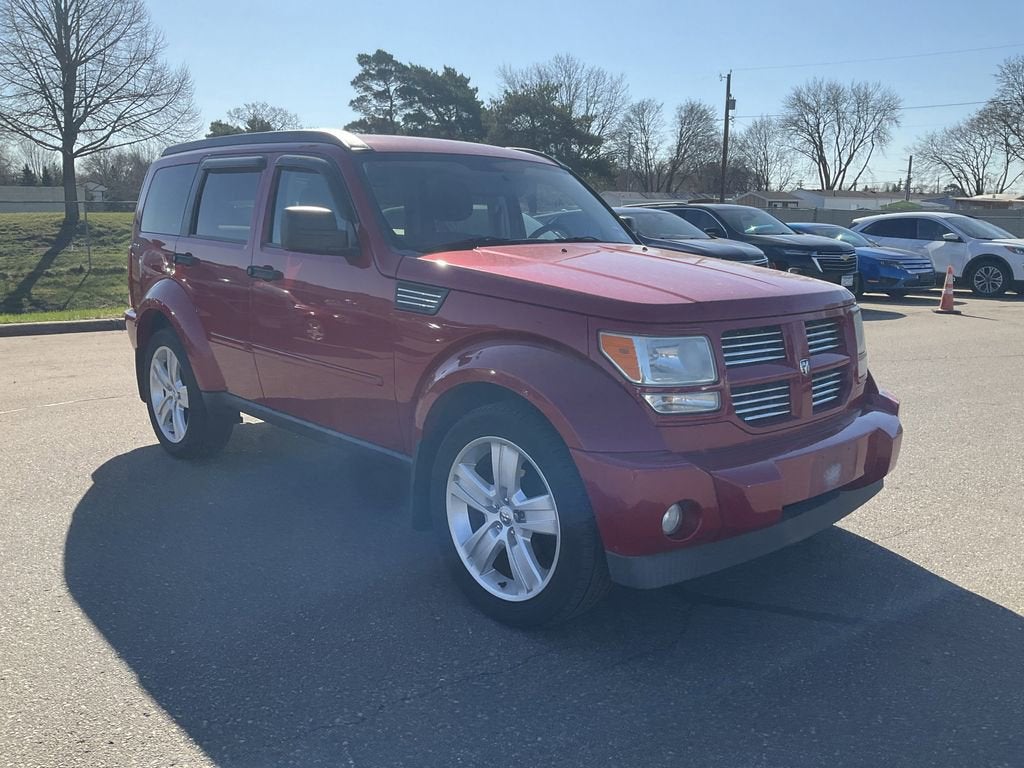 Used 2011 Dodge Nitro Heat with VIN 1D4PU4GK1BW603513 for sale in Fridley, Minnesota