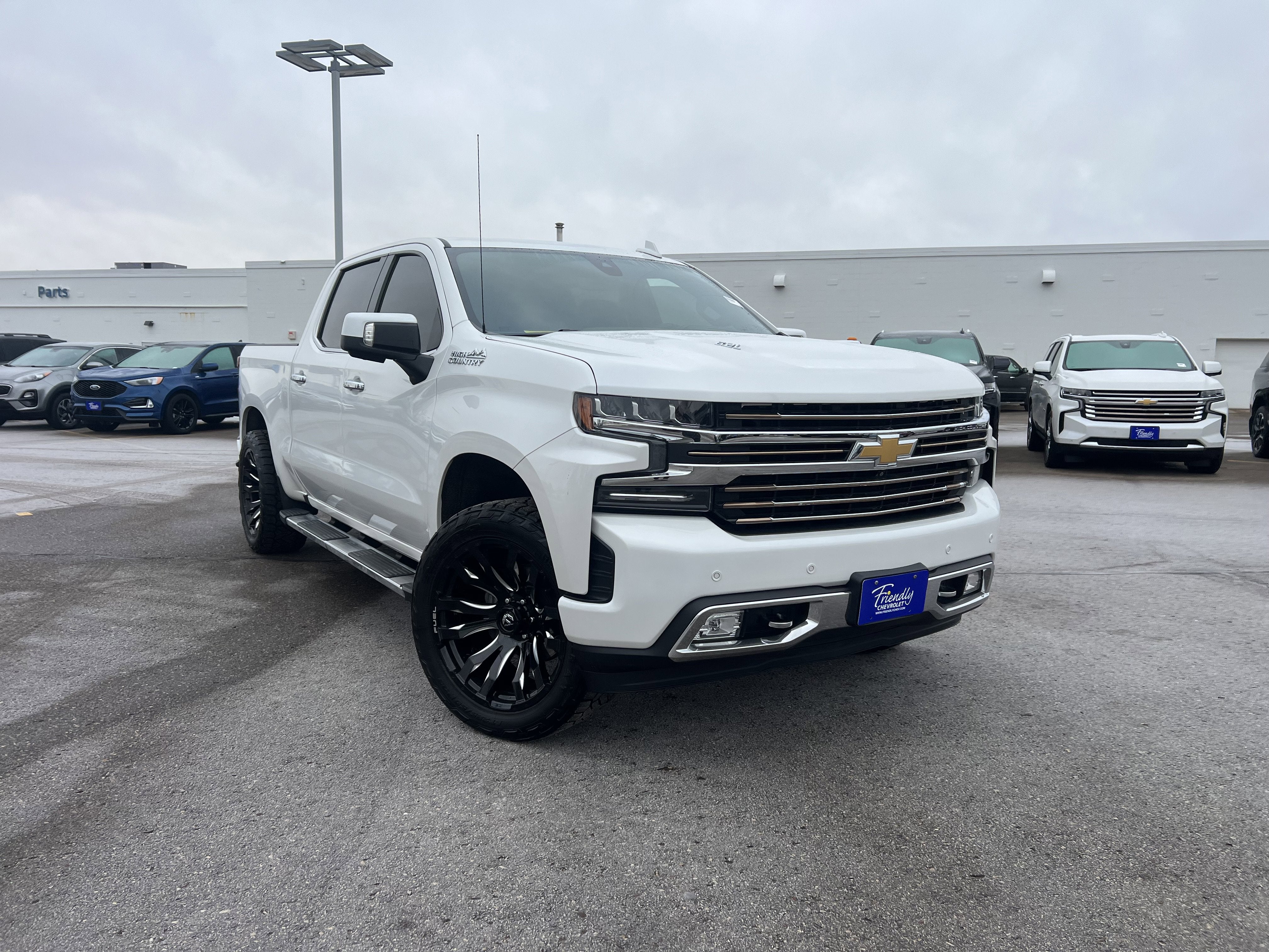 Used 2019 Chevrolet Silverado 1500 High Country with VIN 1GCUYHEL3KZ219318 for sale in Fridley, Minnesota