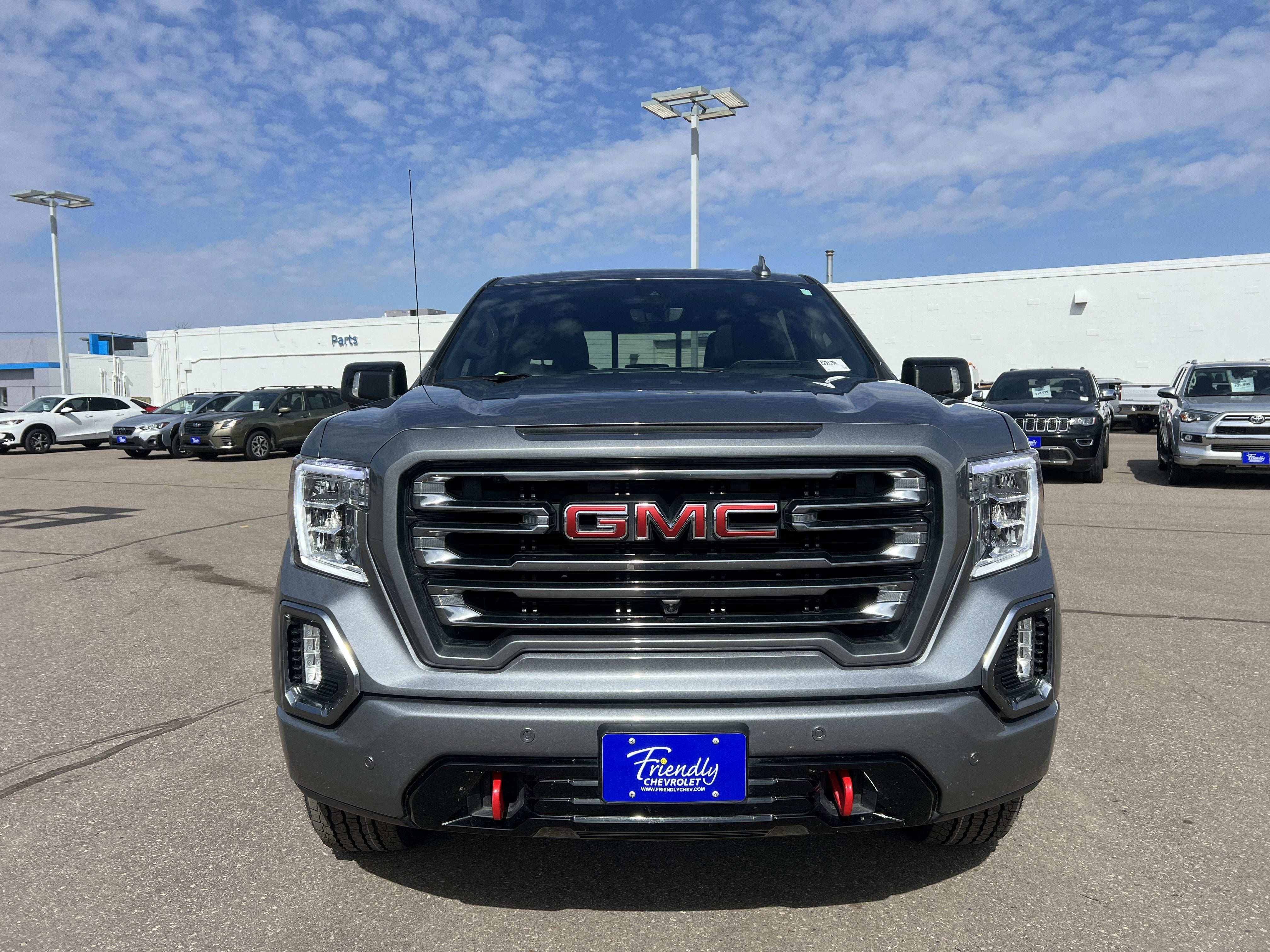 Used 2021 GMC Sierra 1500 AT4 with VIN 1GTP9EEL0MZ237285 for sale in Fridley, Minnesota