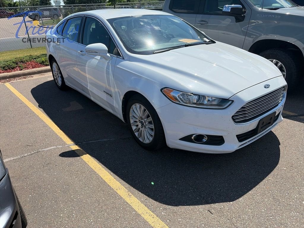 Used 2013 Ford Fusion SE Hybrid with VIN 3FA6P0LU3DR149258 for sale in Fridley, MN
