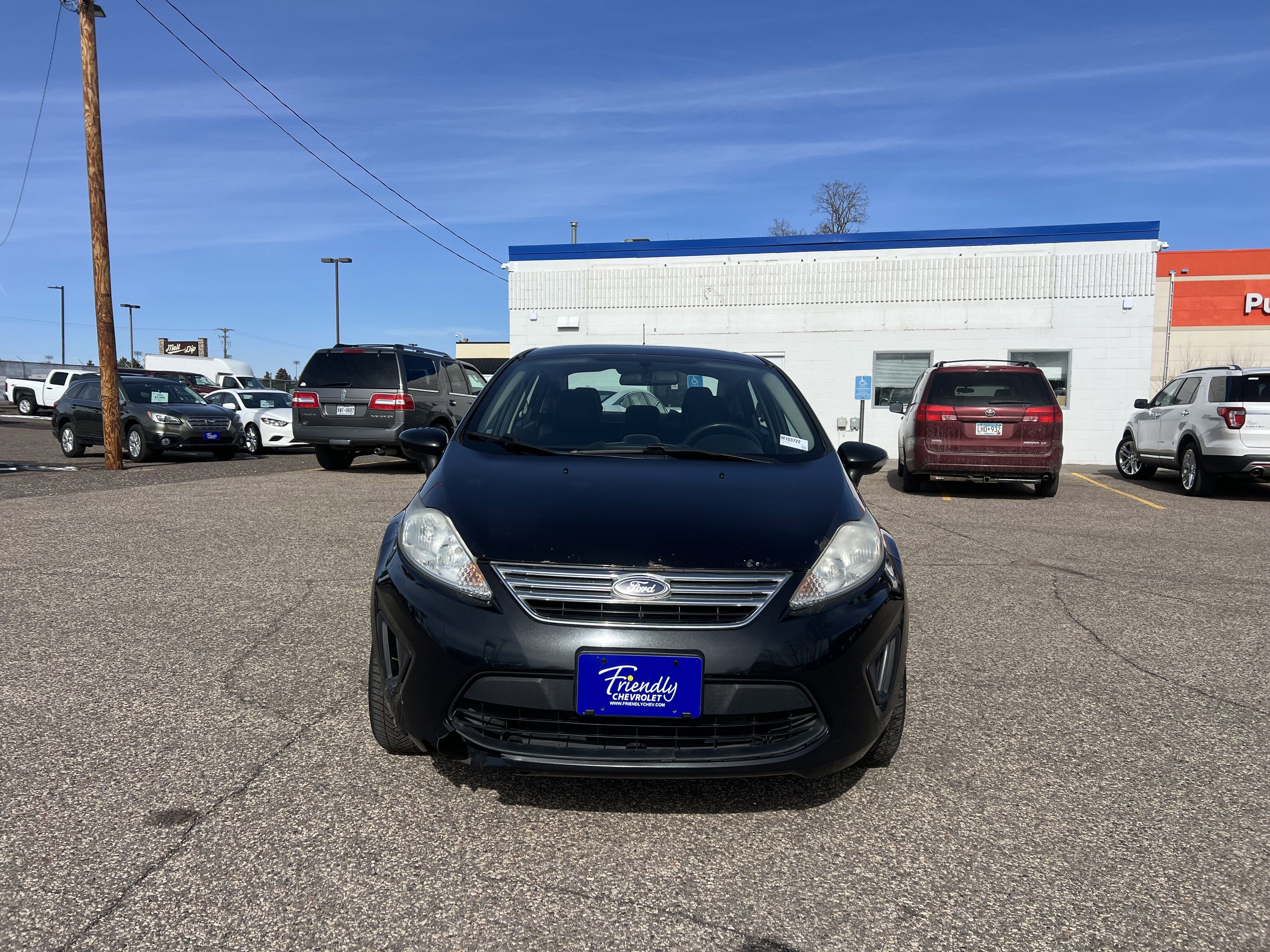 Used 2013 Ford Fiesta SE with VIN 3FADP4BJXDM103722 for sale in Fridley, MN