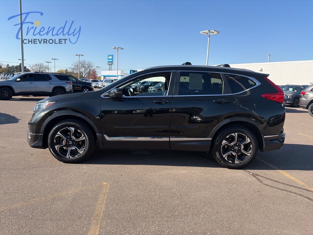 Used 2017 Honda CR-V Touring with VIN 5J6RW2H91HL015826 for sale in Fridley, Minnesota