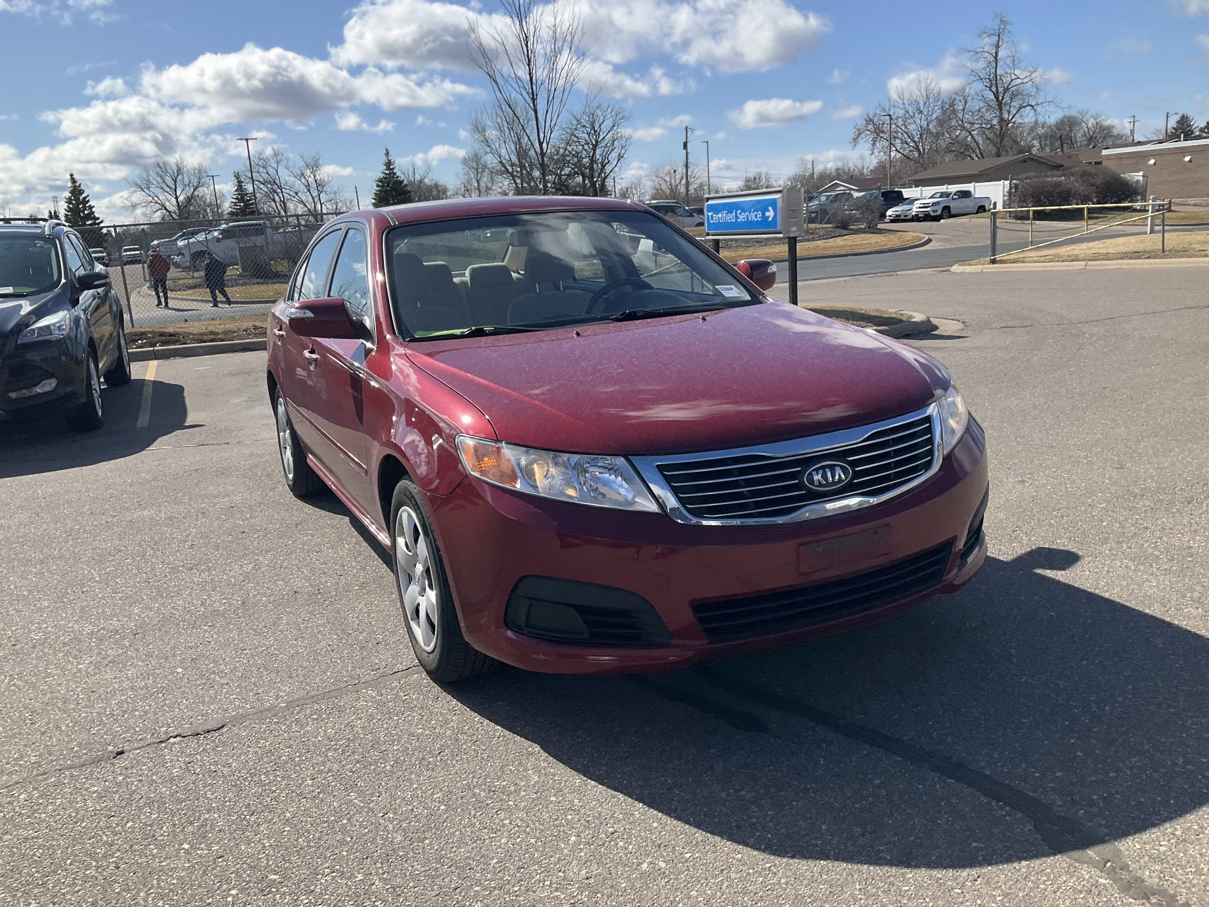 Used 2009 Kia Optima LX with VIN KNAGE228195335084 for sale in Fridley, Minnesota