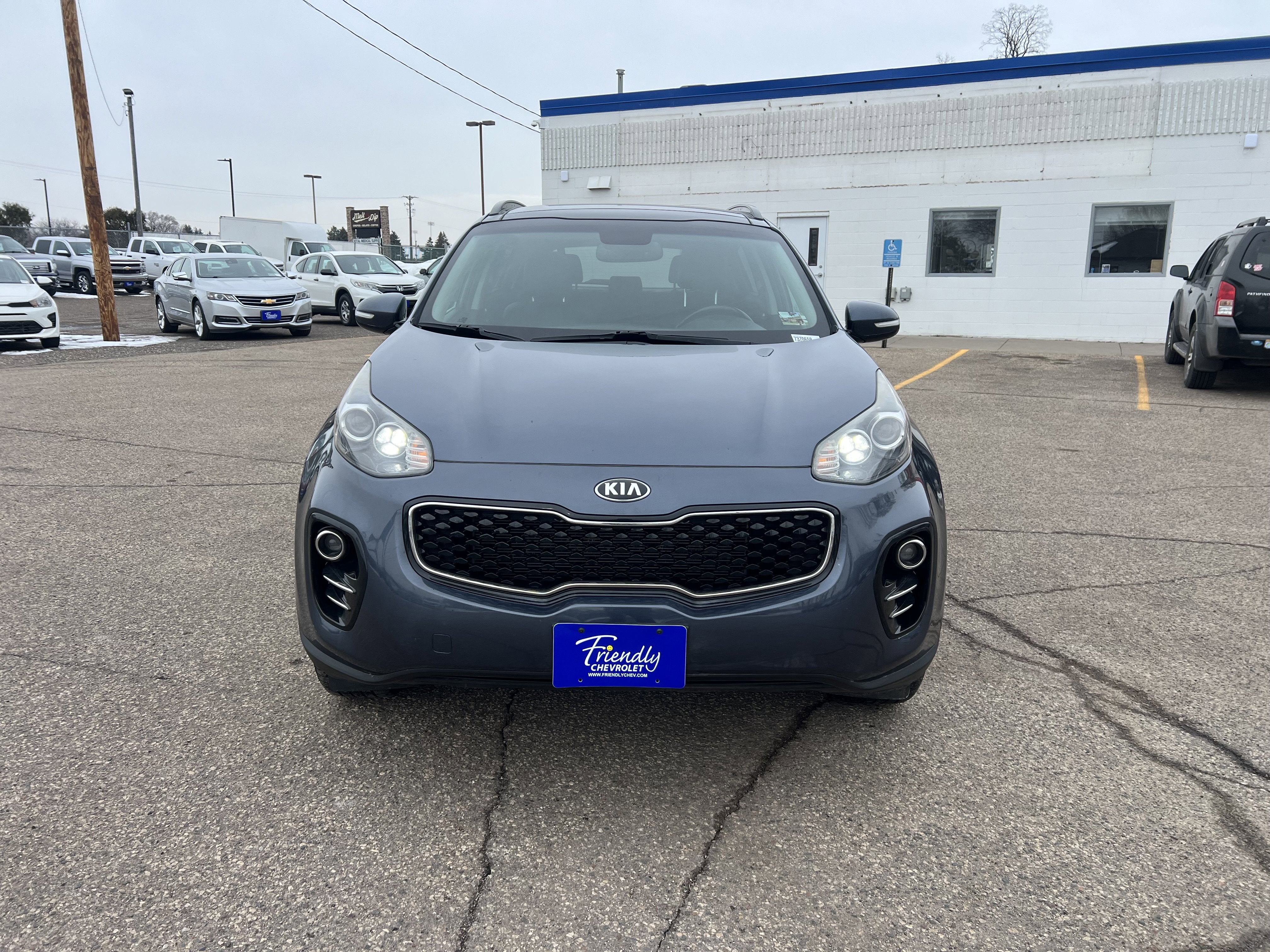 Used 2018 Kia Sportage EX with VIN KNDPNCAC2J7370658 for sale in Fridley, Minnesota