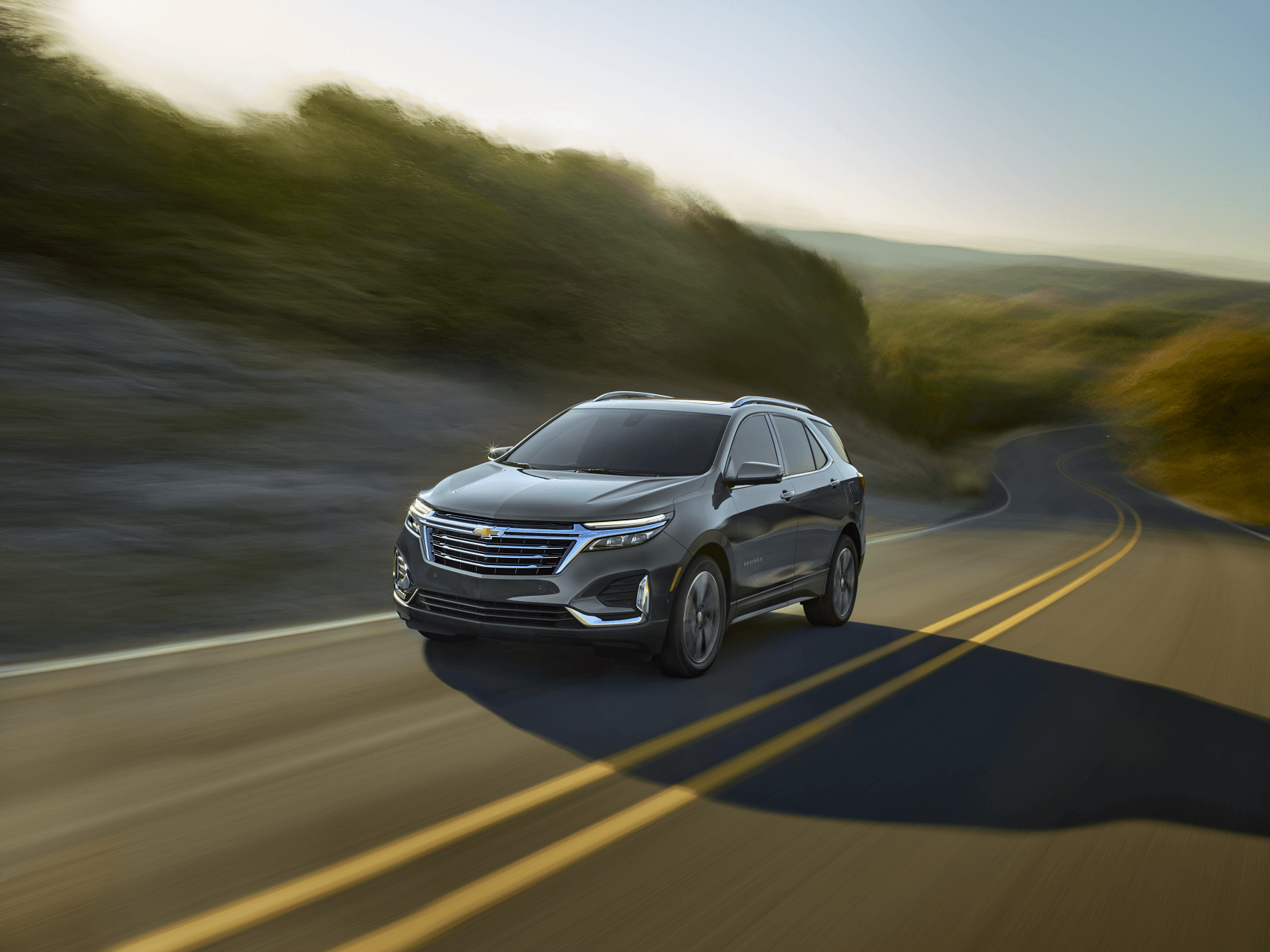 Chevy Equinox driving up mountain with motion blur