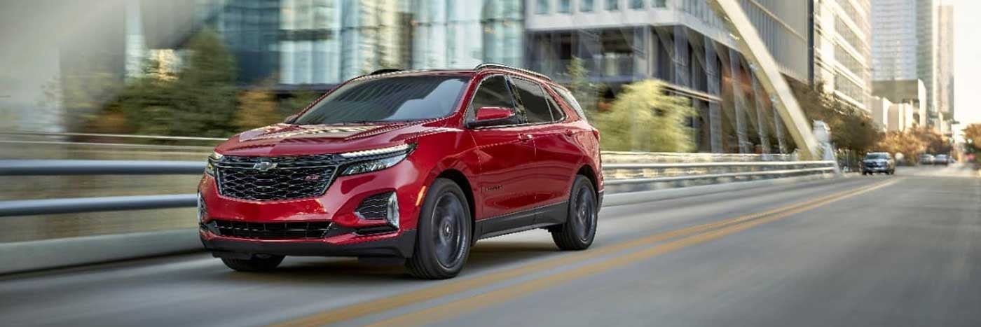 2024 Chevrolet Equinox driving in The Twin Cities