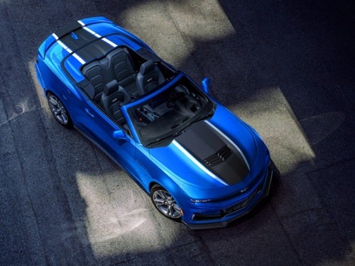 2024 Chevrolet Camaro overhead view of car with no top on parked on a road at night