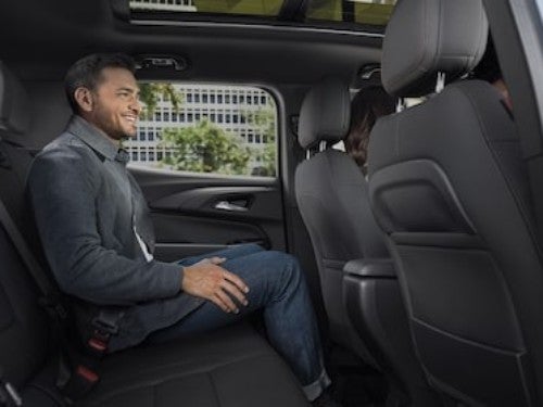 2025 Chevrolet Trailblazer view of man sitting ib back seat