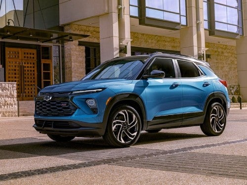 2025 Chevrolet Trailblazer RS driving down a city street
